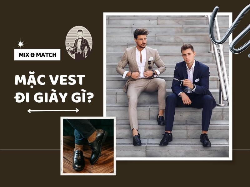 Người đàn ông lịch lãm trong bộ vest xanh navy kết hợp cùng đôi giày da nâu bóng, thể hiện sự sang trọng và tinh tế trong phong cách mặc vest đi giày gì.
